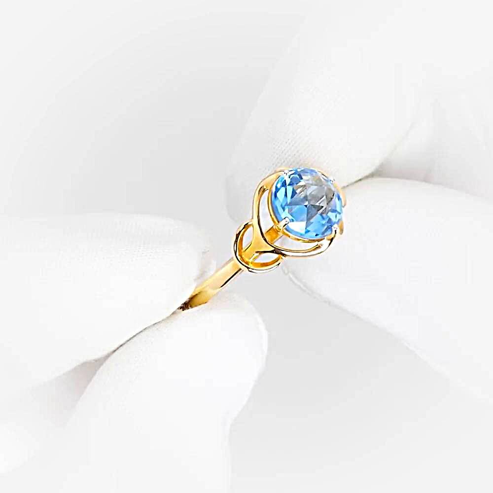 Кольцо с топазом из красного золота 585 пробы 1