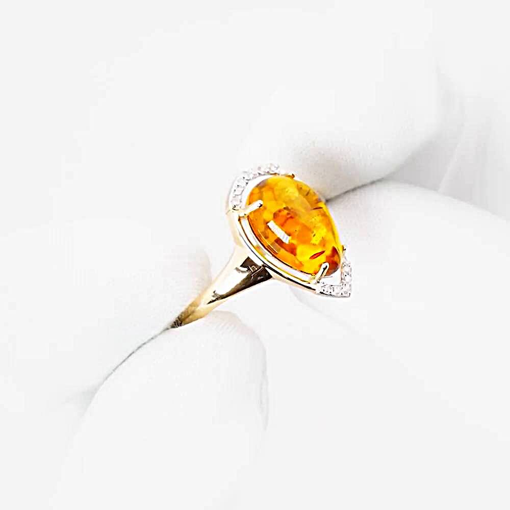 Кольцо с янтарем и фианитами из красного золота 585 пробы 1