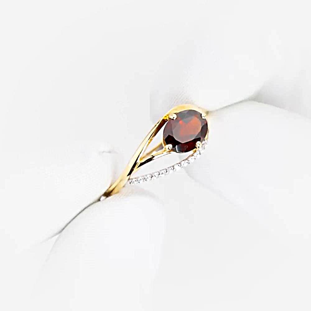 Кольцо с гранатами и фианитами из красного золота 585 пробы 1