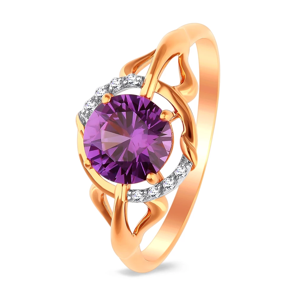 Кольцо с александритом синтетическим и фианитами из красного золота 585 пробы Кольцо с александритом синтетическим и фианитами из красного золота 585 пробы