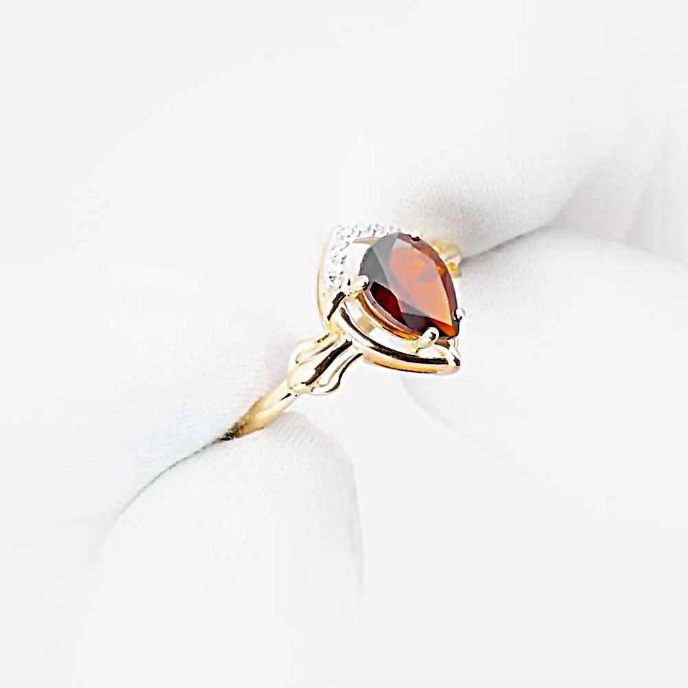 Кольцо с гранатами и фианитами из красного золота 585 пробы 1