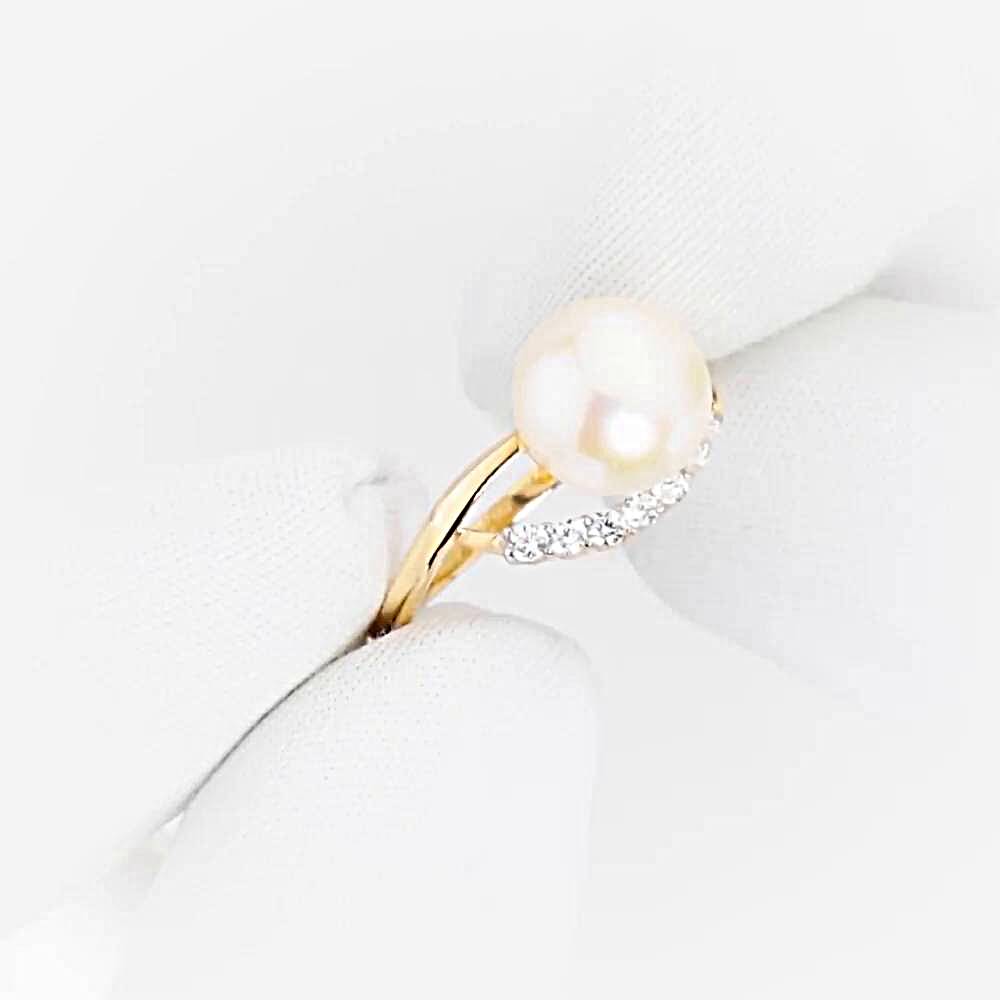 Кольцо с культивированным жемчугом и фианитами из красного золота 585 пробы 1