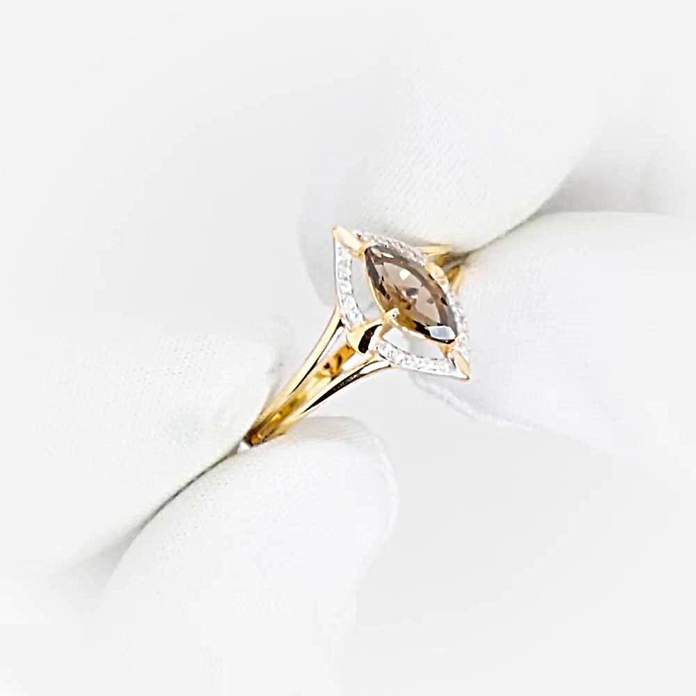 Кольцо с раух-топазами и фианитами из красного золота 585 пробы 1