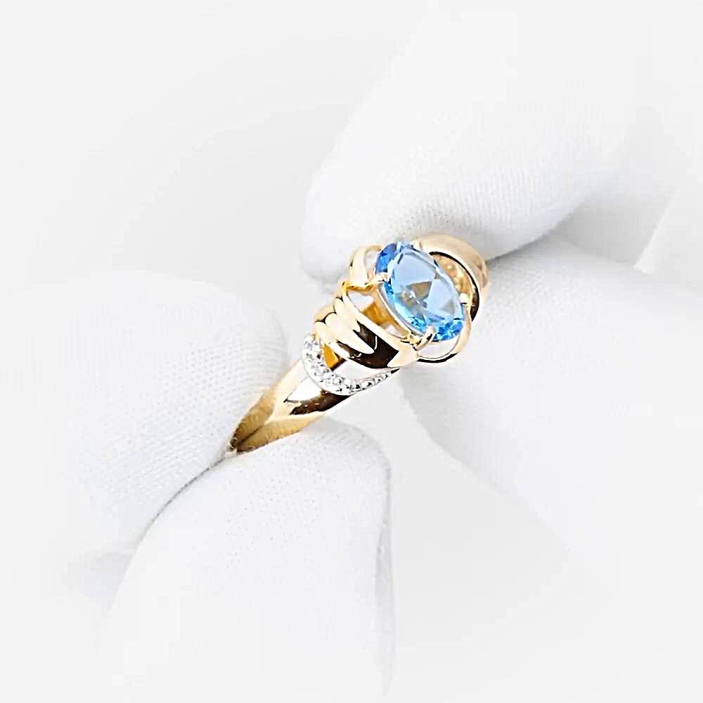 Кольцо с топазами и фианитами из красного золота 585 пробы