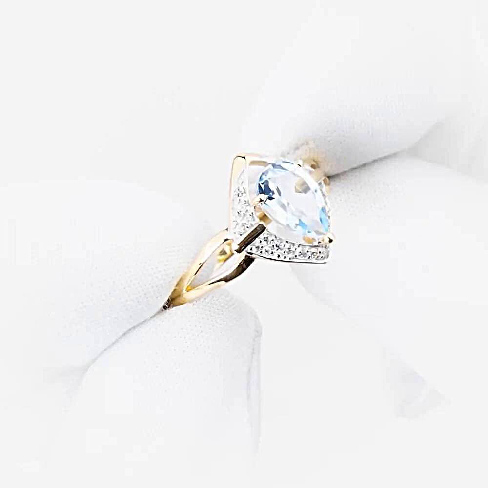 Кольцо с топазами и фианитами из красного золота 585 пробы