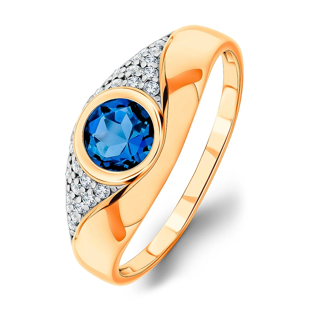 Кольцо с топазом лондон и фианитами из красного золота 585 пробы