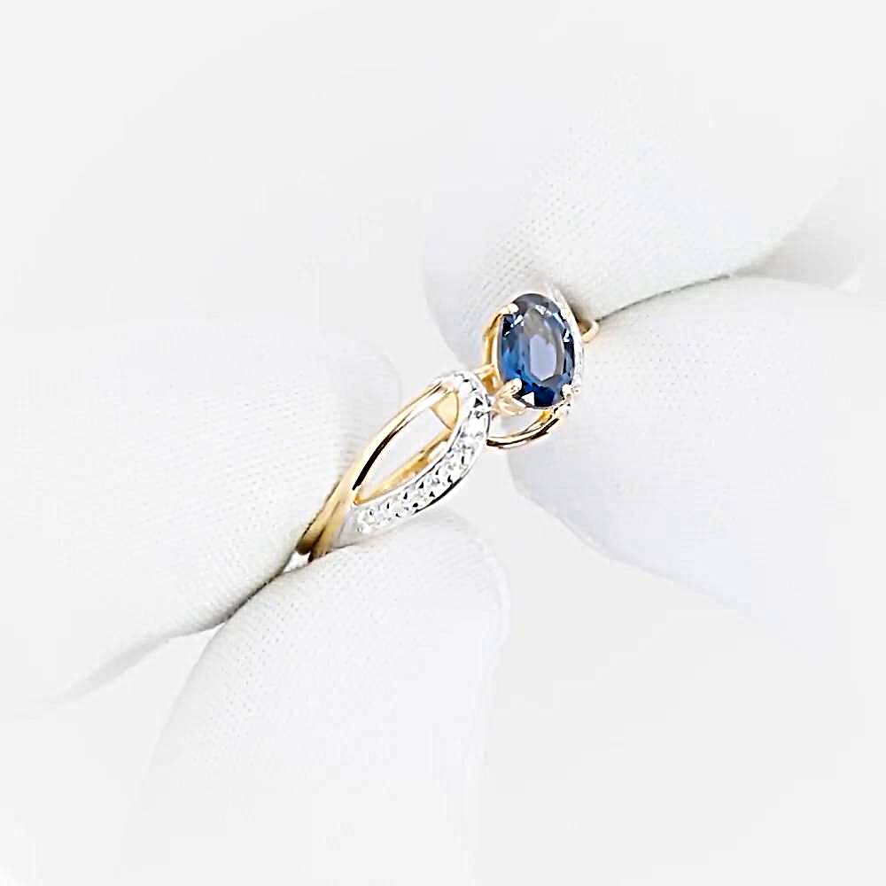 Кольцо с топазом лондон и фианитами из красного золота 585 пробы 1