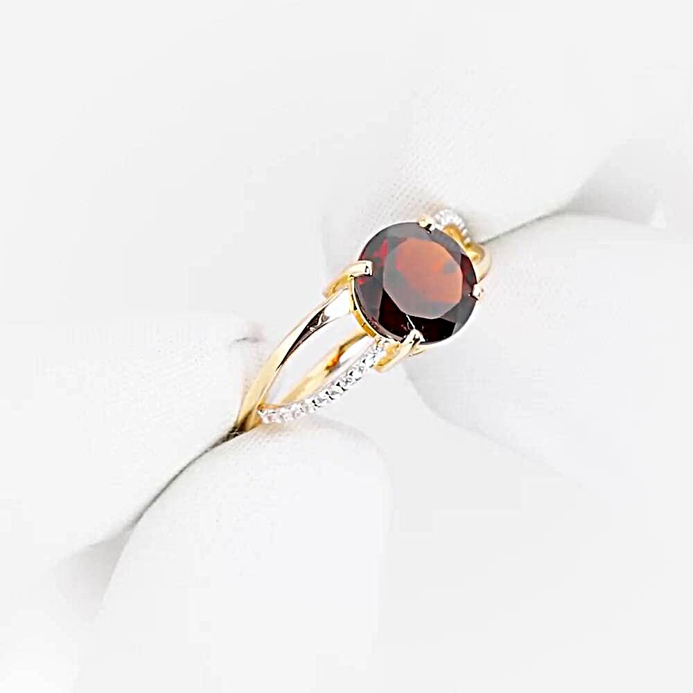 Кольцо с гранатами и фианитами из красного золота 585 пробы