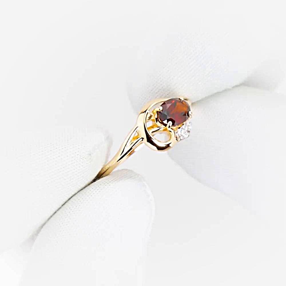 Кольцо с гранатами и фианитами из красного золота 585 пробы