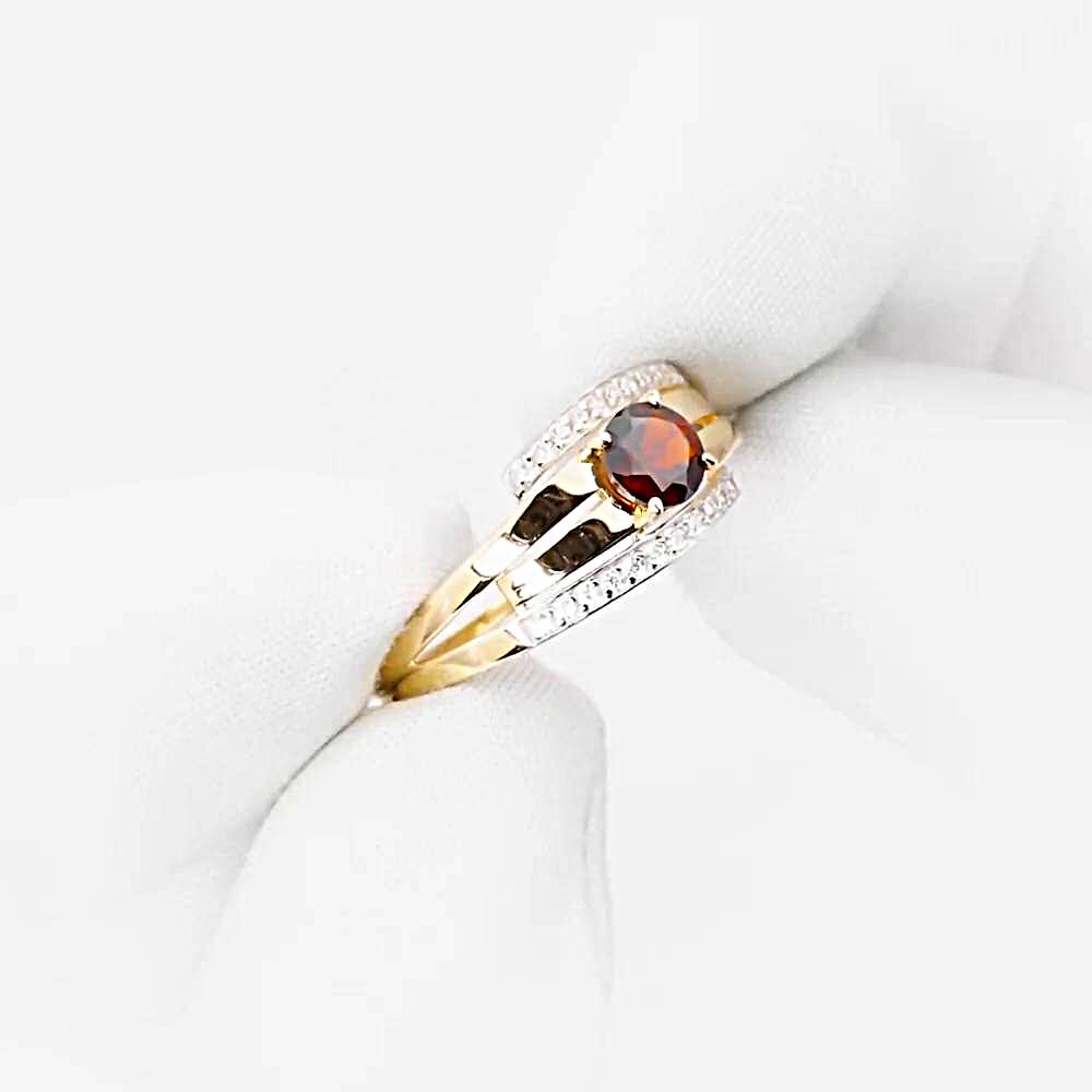 Кольцо с гранатами и фианитами из красного золота 585 пробы 1