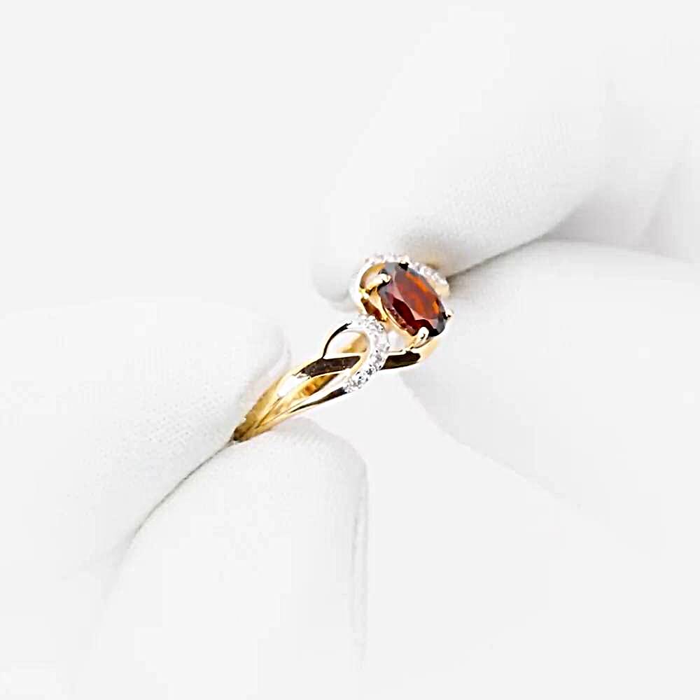 Кольцо с гранатами и фианитами из красного золота 375 пробы 1