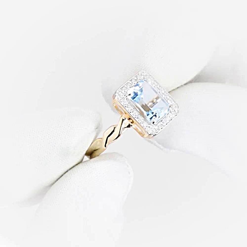 Кольцо с топазами и фианитами из красного золота 375 пробы 1