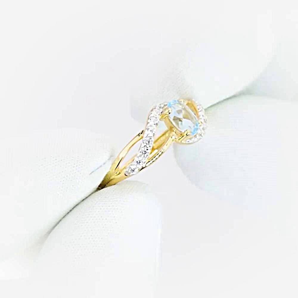 Кольцо с топазами и фианитами из красного золота 375 пробы 1