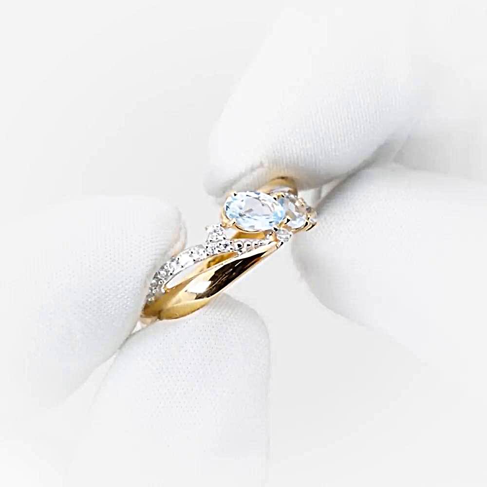 Кольцо с топазами и фианитами из красного золота 585 пробы