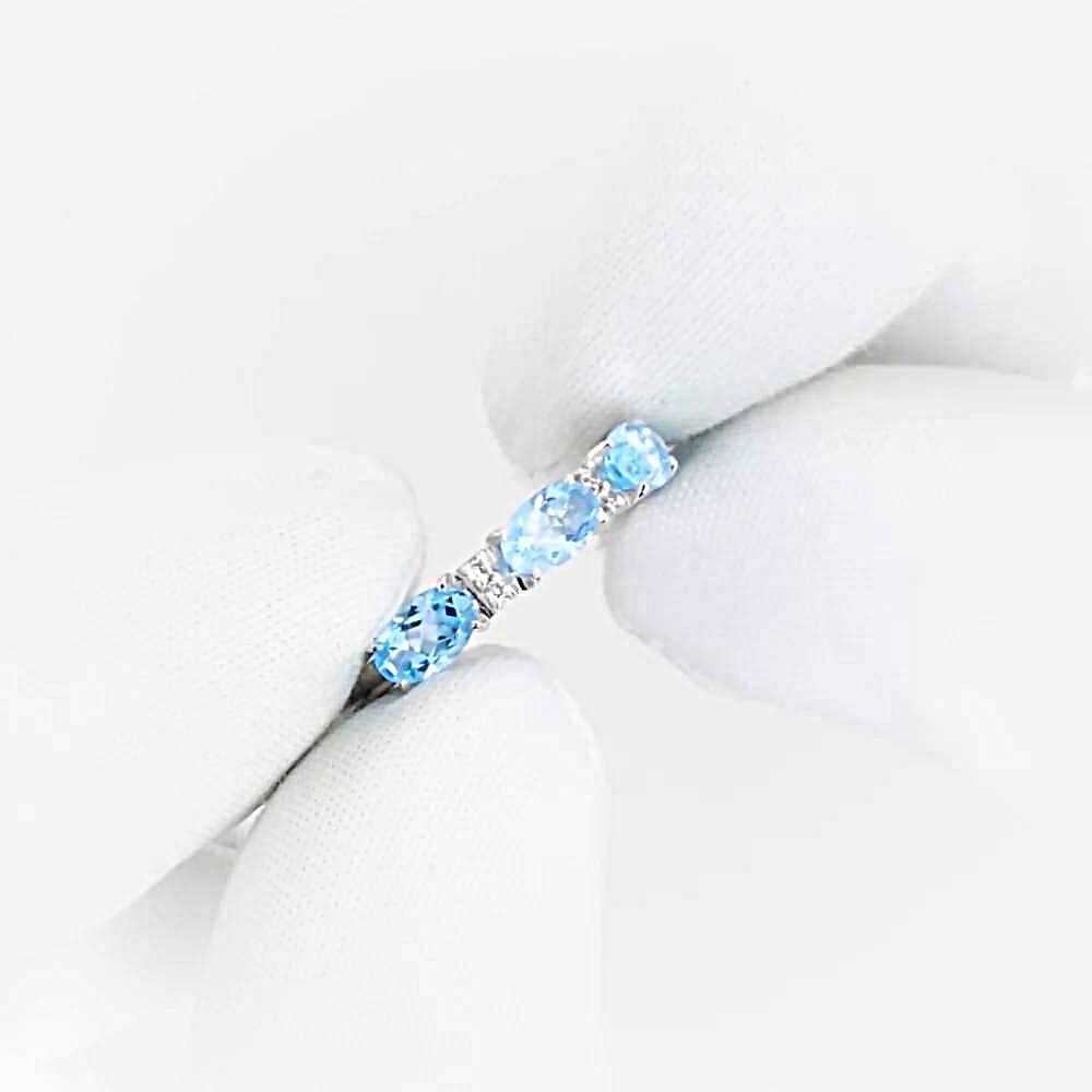 Кольцо с топазами и фианитами из белого золота 585 пробы