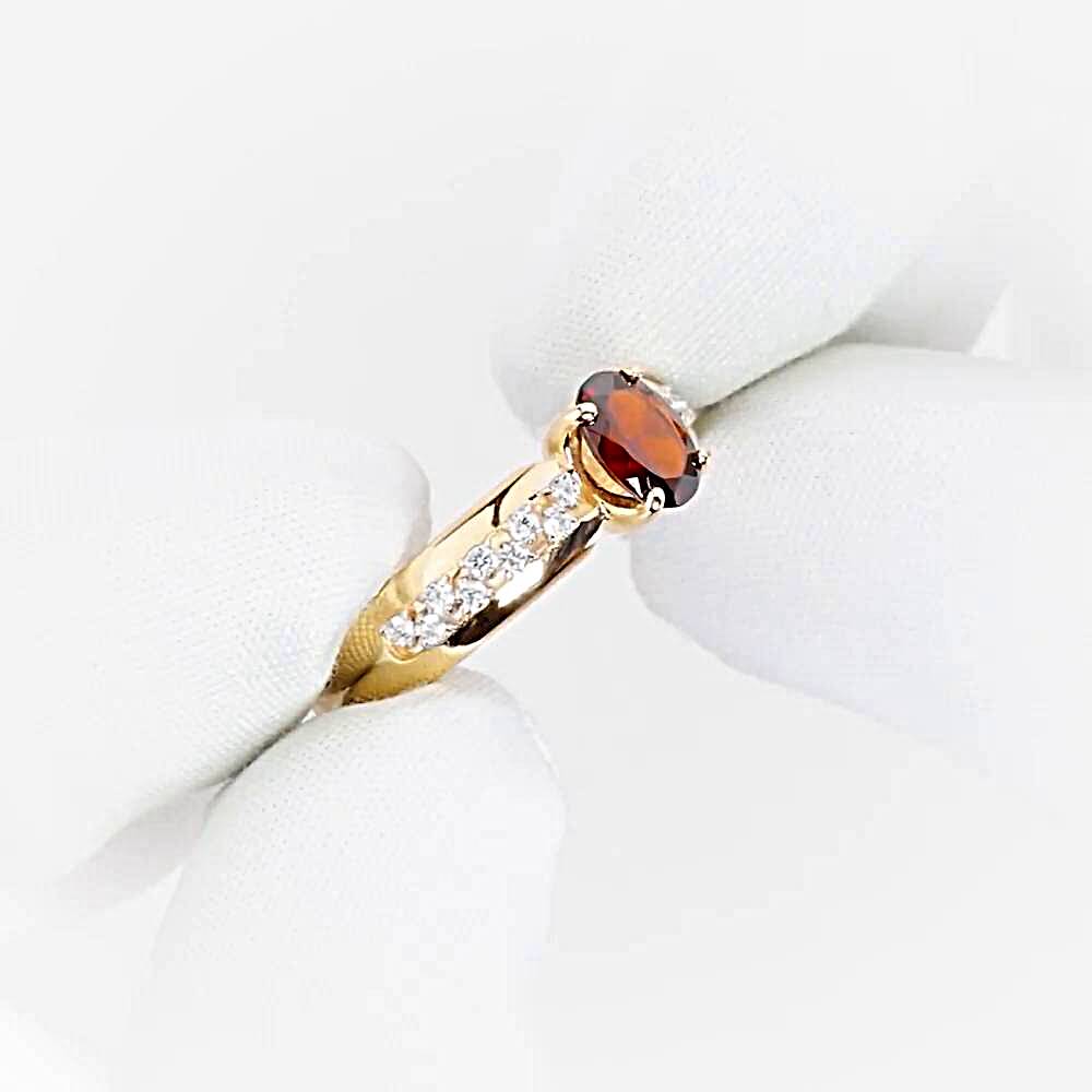 Кольцо с гранатами и фианитами из красного золота 585 пробы