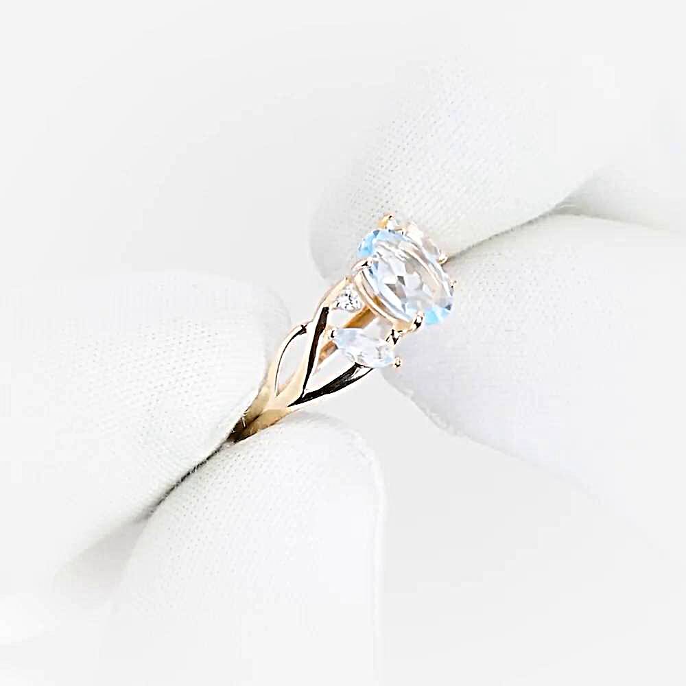 Кольцо с топазами и фианитами из красного золота 375 пробы