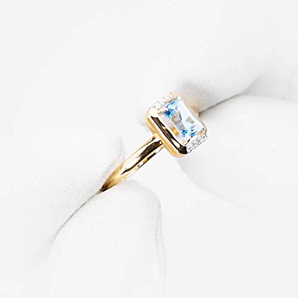 Кольцо с топазами и бриллиантами из красного золота 585 пробы