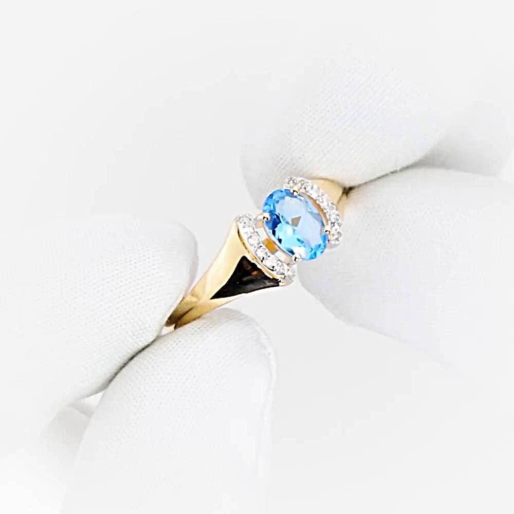 Кольцо с топазами и бриллиантами из красного золота 585 пробы