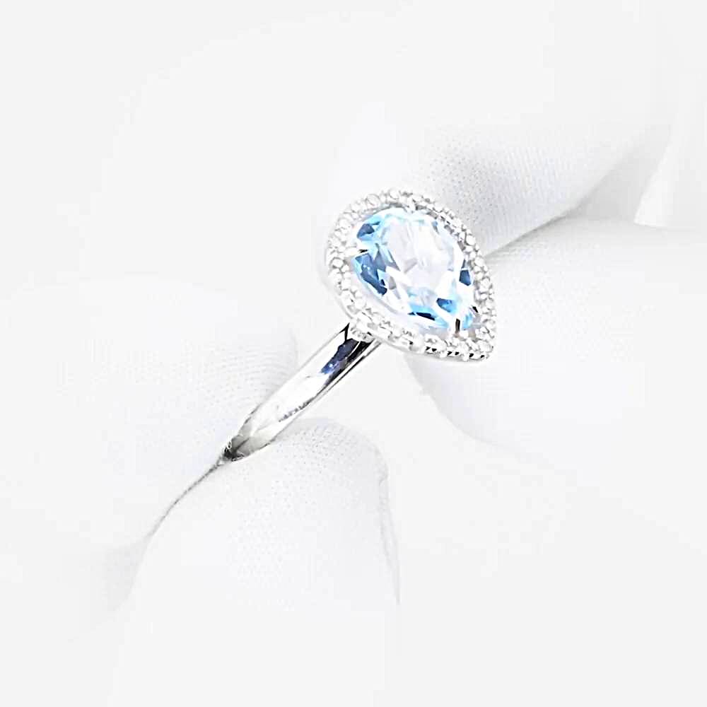 Кольцо с топазами и бриллиантами из белого золота 585 пробы Кольцо с топазами и бриллиантами из белого золота 585 пробы