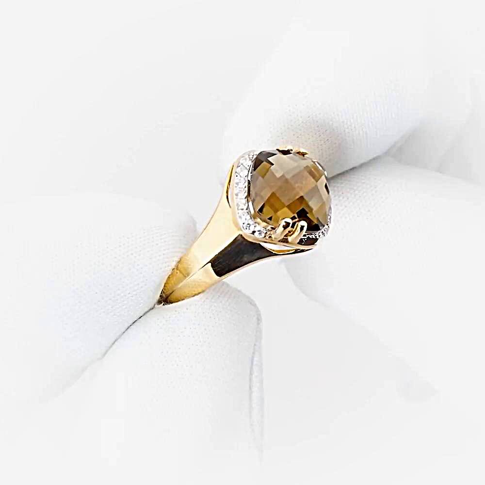 Кольцо с раух-топазами и фианитами из красного золота 585 пробы