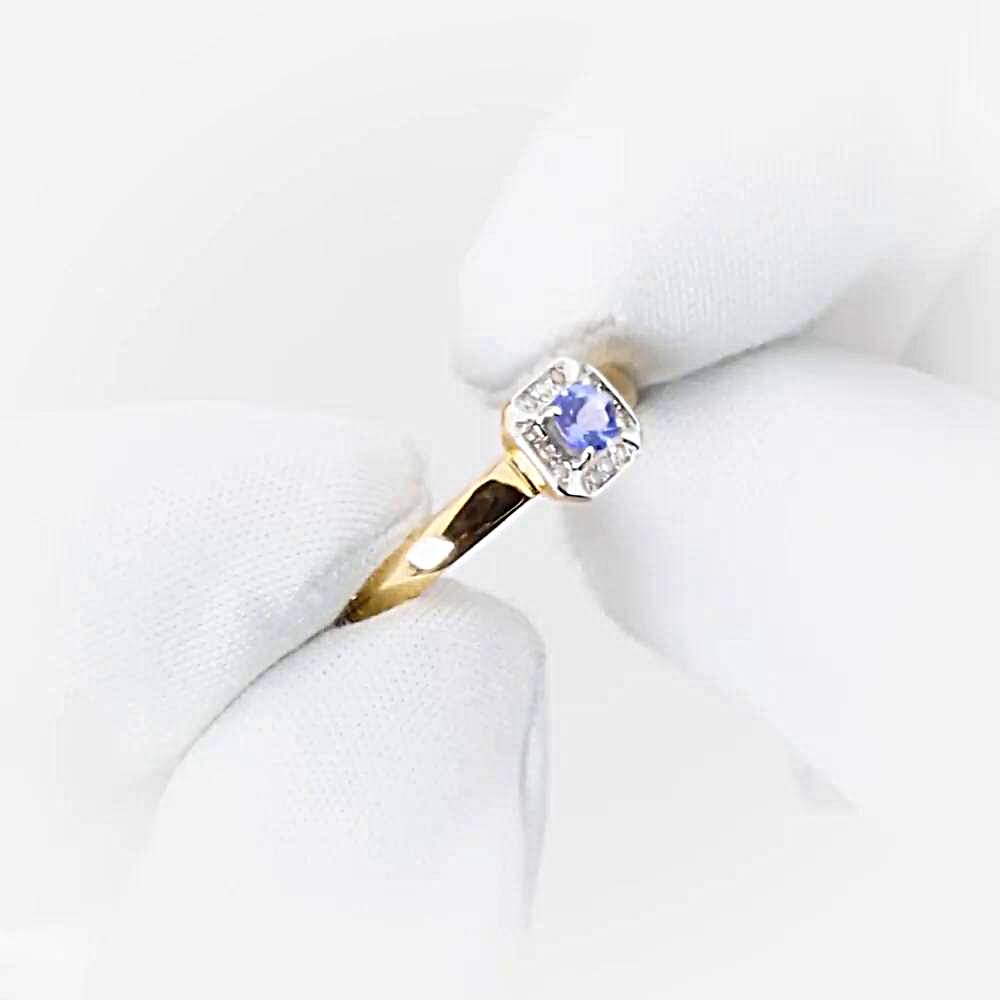 Кольцо с танзанитами и бриллиантами из красного золота 585 пробы