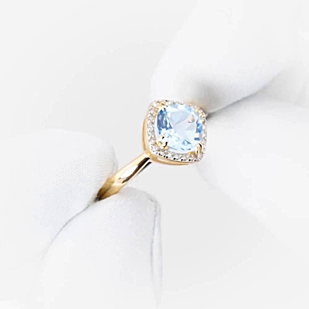 Кольцо с топазами и бриллиантами из красного золота 585 пробы