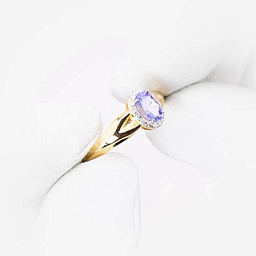 Кольцо с танзанитами и бриллиантами из красного золота 585 пробы