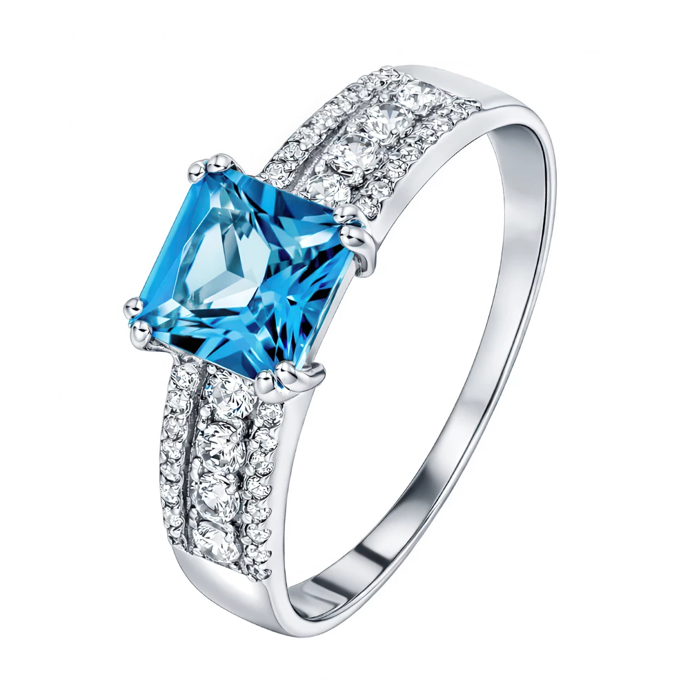 Кольцо с топазом лондон и фианитами из белого золота 585 пробы