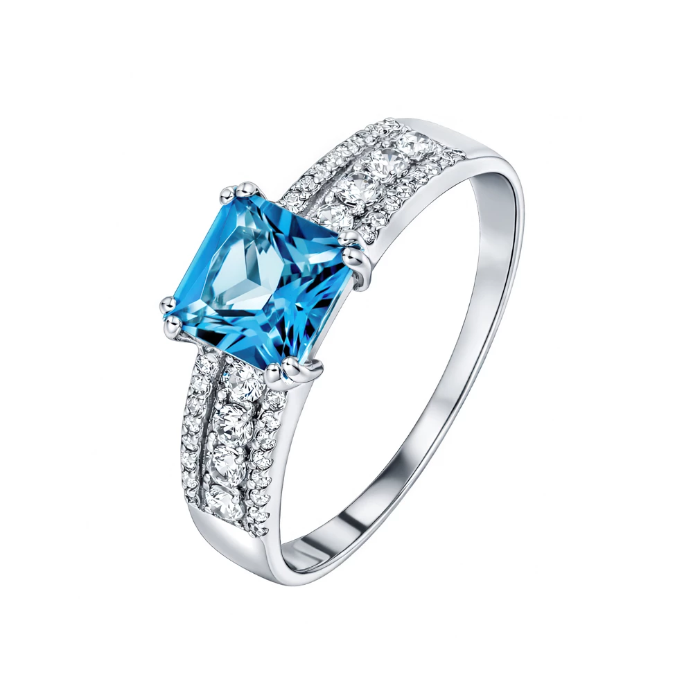 Кольцо с топазом лондон и фианитами из белого золота 585 пробы