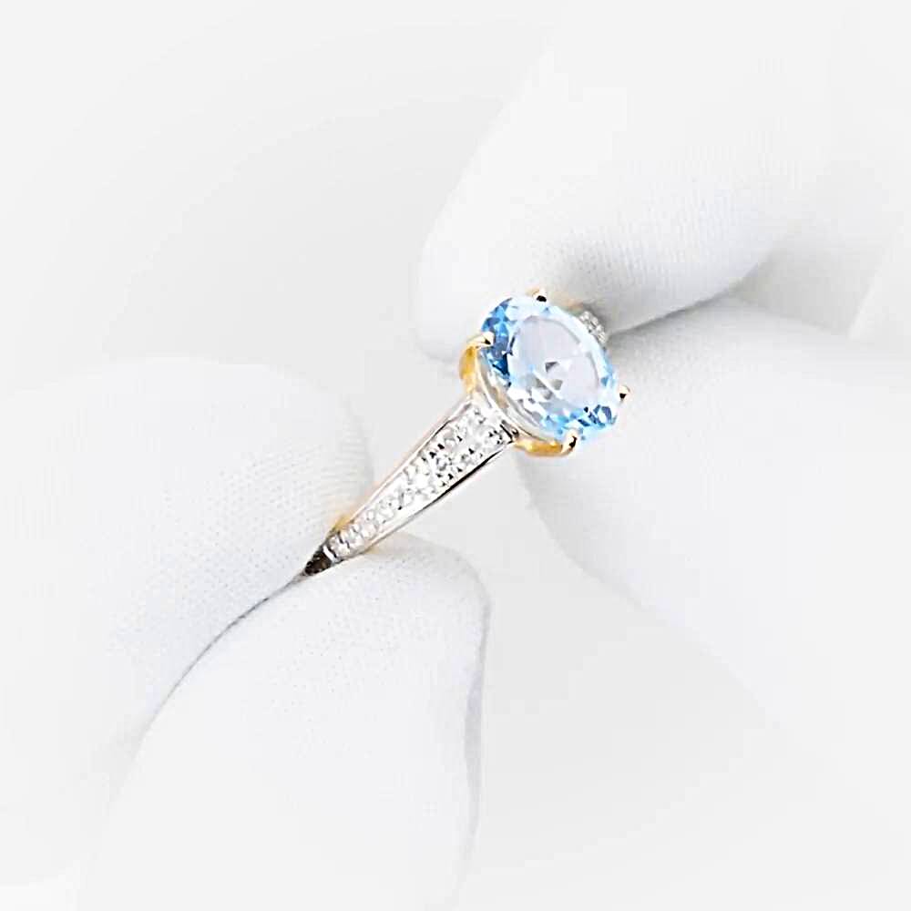 Кольцо с топазами и бриллиантами из красного золота 585 пробы