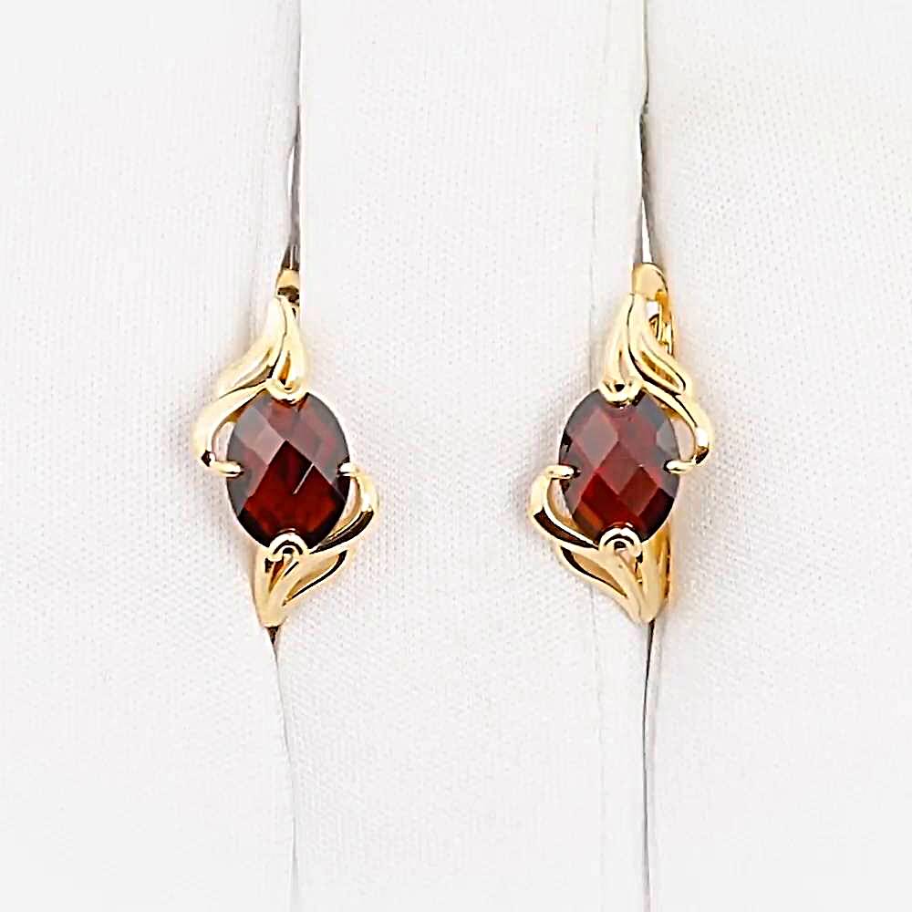 Серьги с гранатом и -ом из красного золота 585 пробы 1