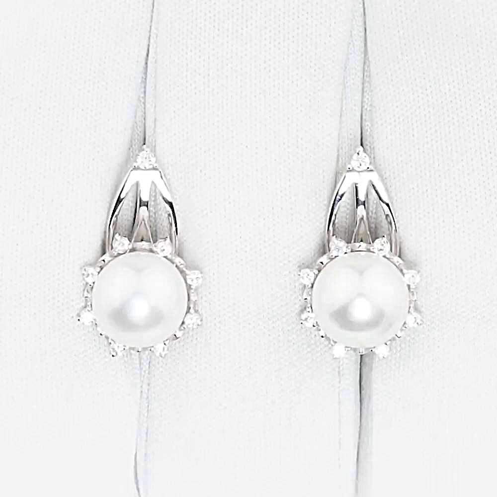 Серьги с культивированным жемчугом и фианитами из белого золота 585 пробы 1