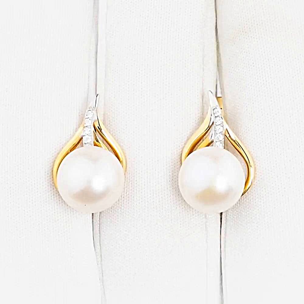 Серьги с культивированным жемчугом и фианитами из красного золота 585 пробы 1