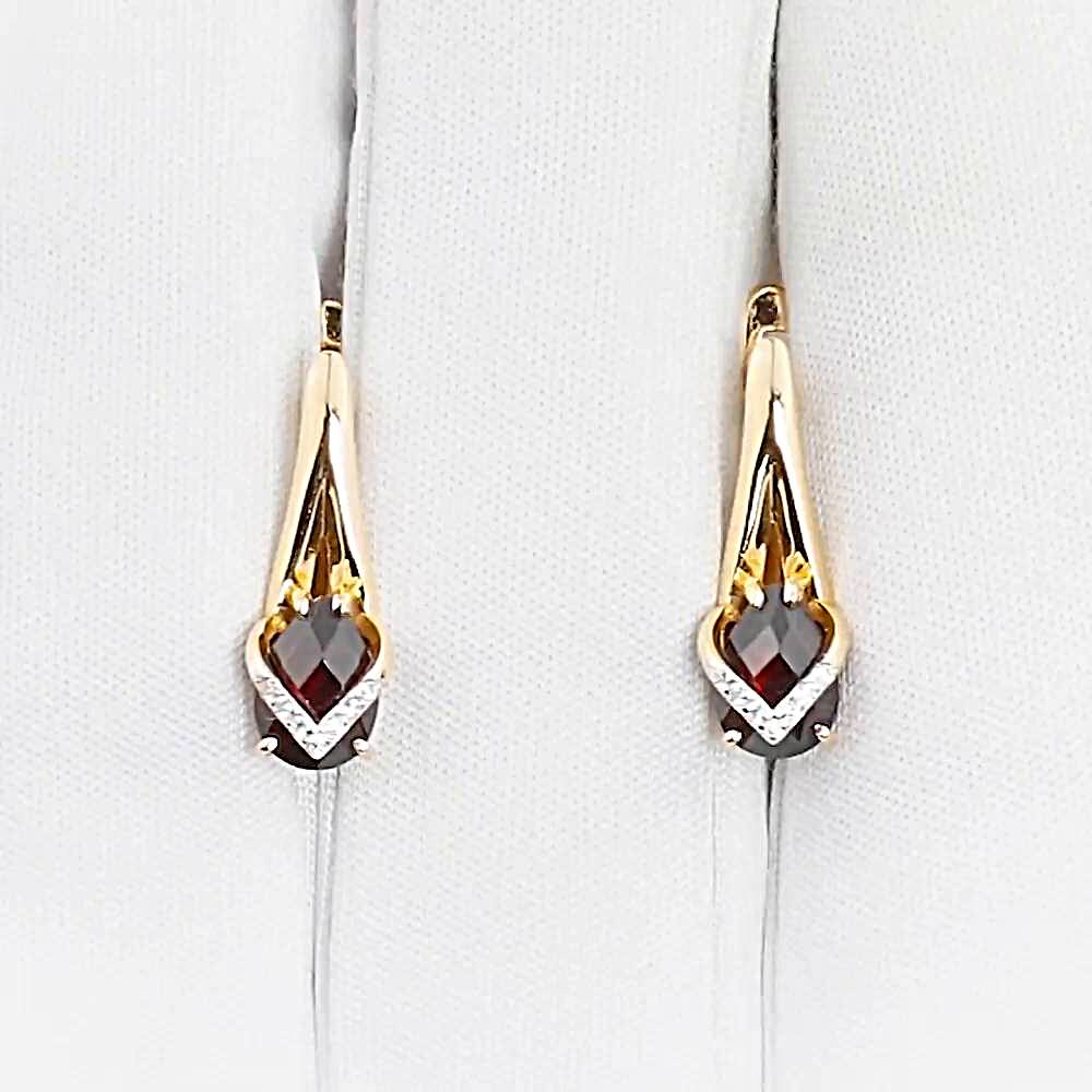 Серьги с гранатами и фианитами из красного золота 585 пробы 1