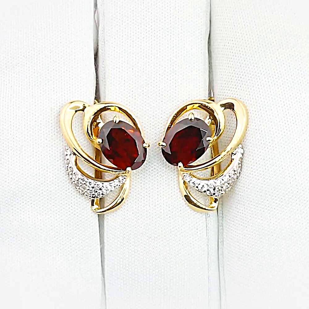 Серьги с гранатами и фианитами из красного золота 585 пробы 1