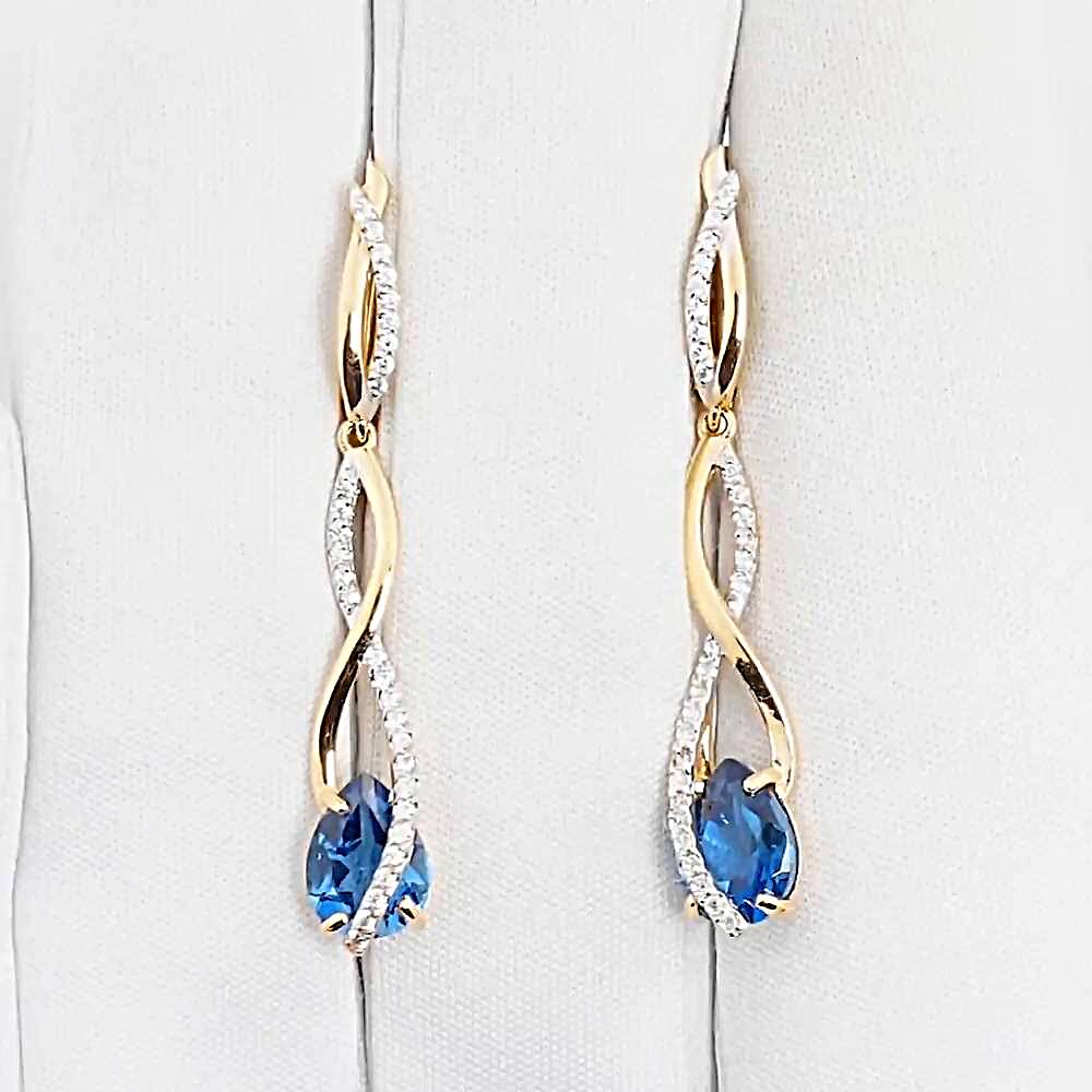 Серьги с топазом лондон и фианитами из красного золота 585 пробы