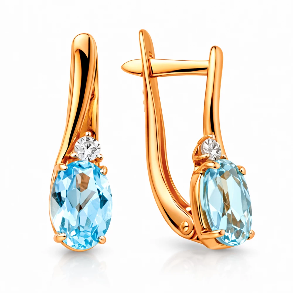 Серьги с топазами и фианитами из красного золота 585 пробы