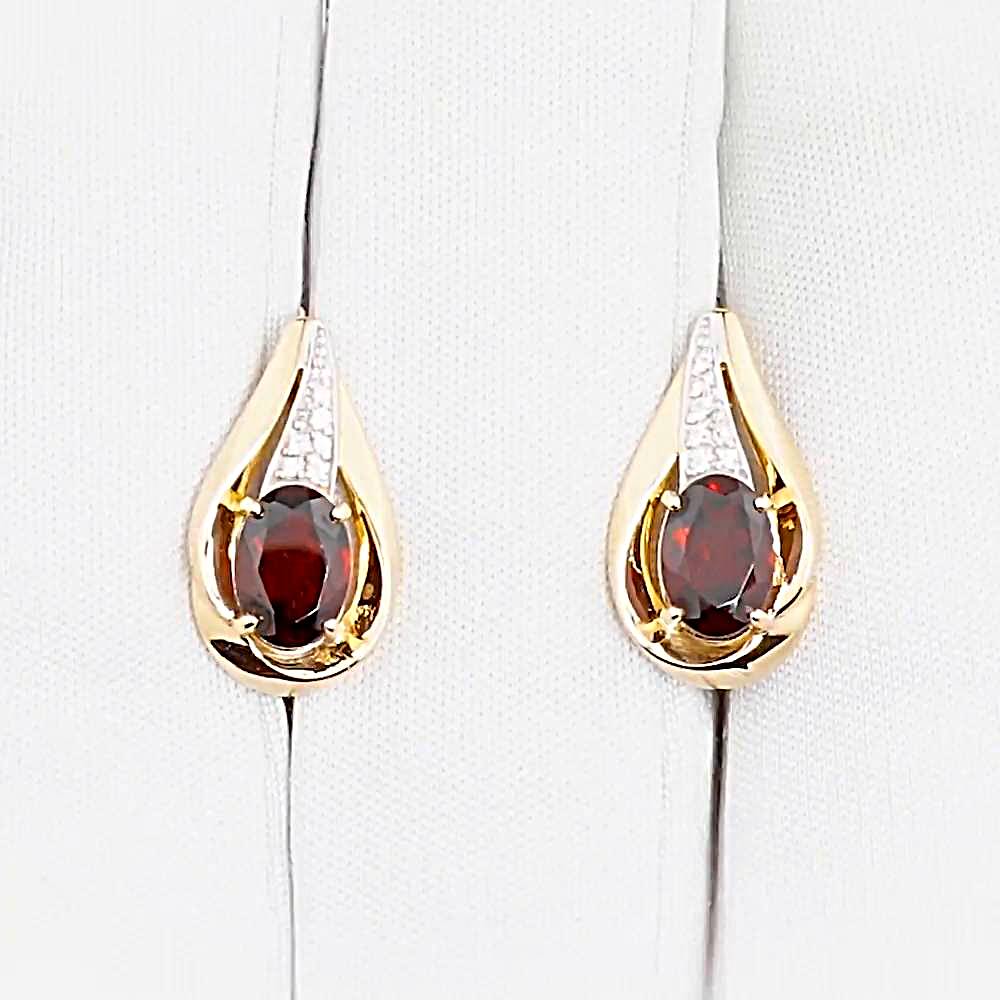 Серьги с гранатами и фианитами из красного золота 585 пробы