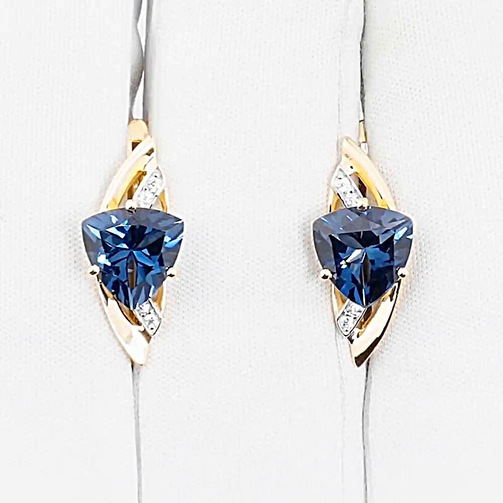 Серьги с топазом лондон и фианитами из красного золота 585 пробы