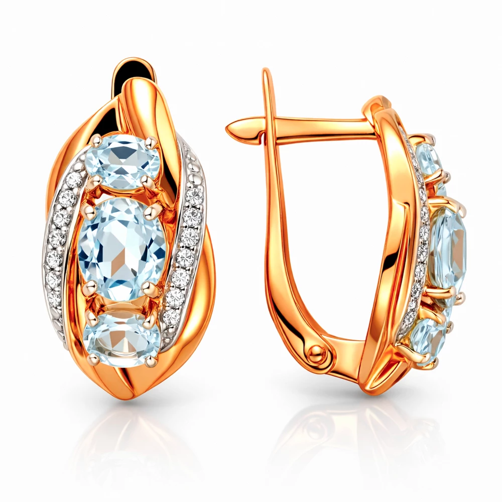 Серьги с топазами и фианитами из красного золота 585 пробы