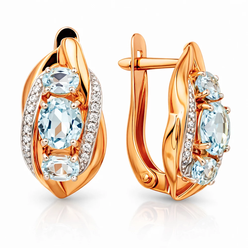 Серьги с топазами и фианитами из красного золота 585 пробы