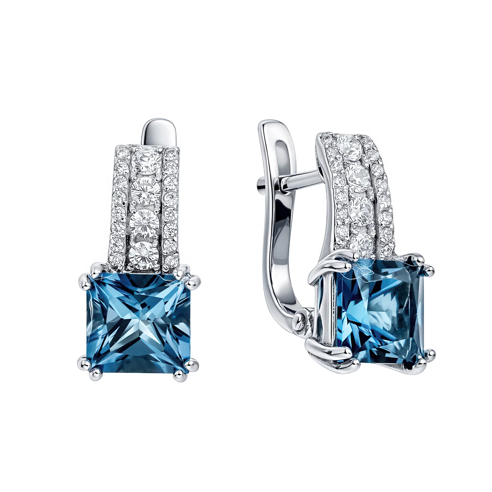 Серьги с топазом лондон и фианитами из белого золота 585 пробы