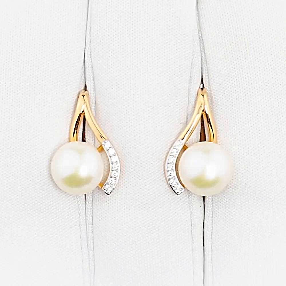 Серьги с культивированным жемчугом и фианитами из красного золота 375 пробы 1