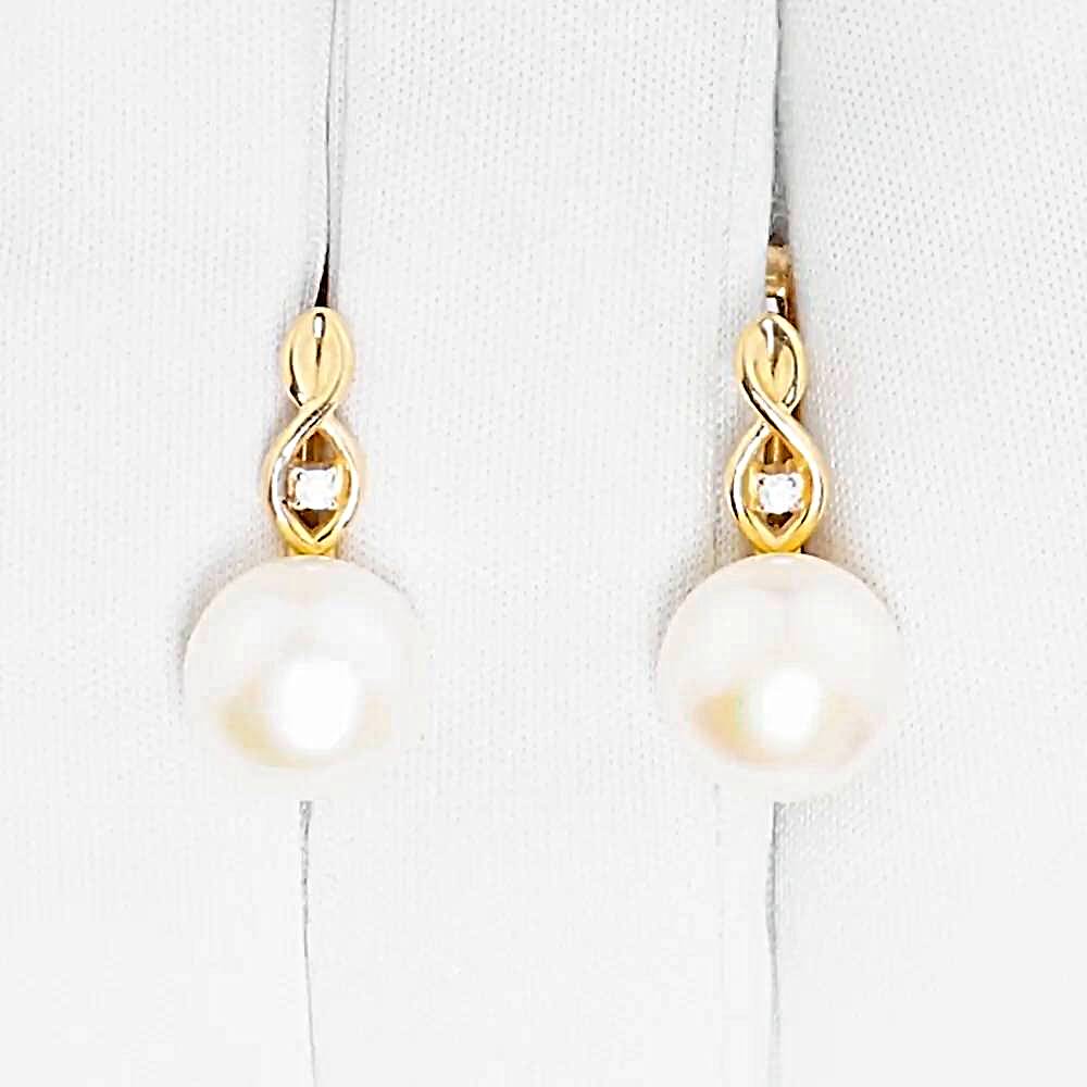 Серьги с культивированным жемчугом и фианитами из красного золота 375 пробы 1