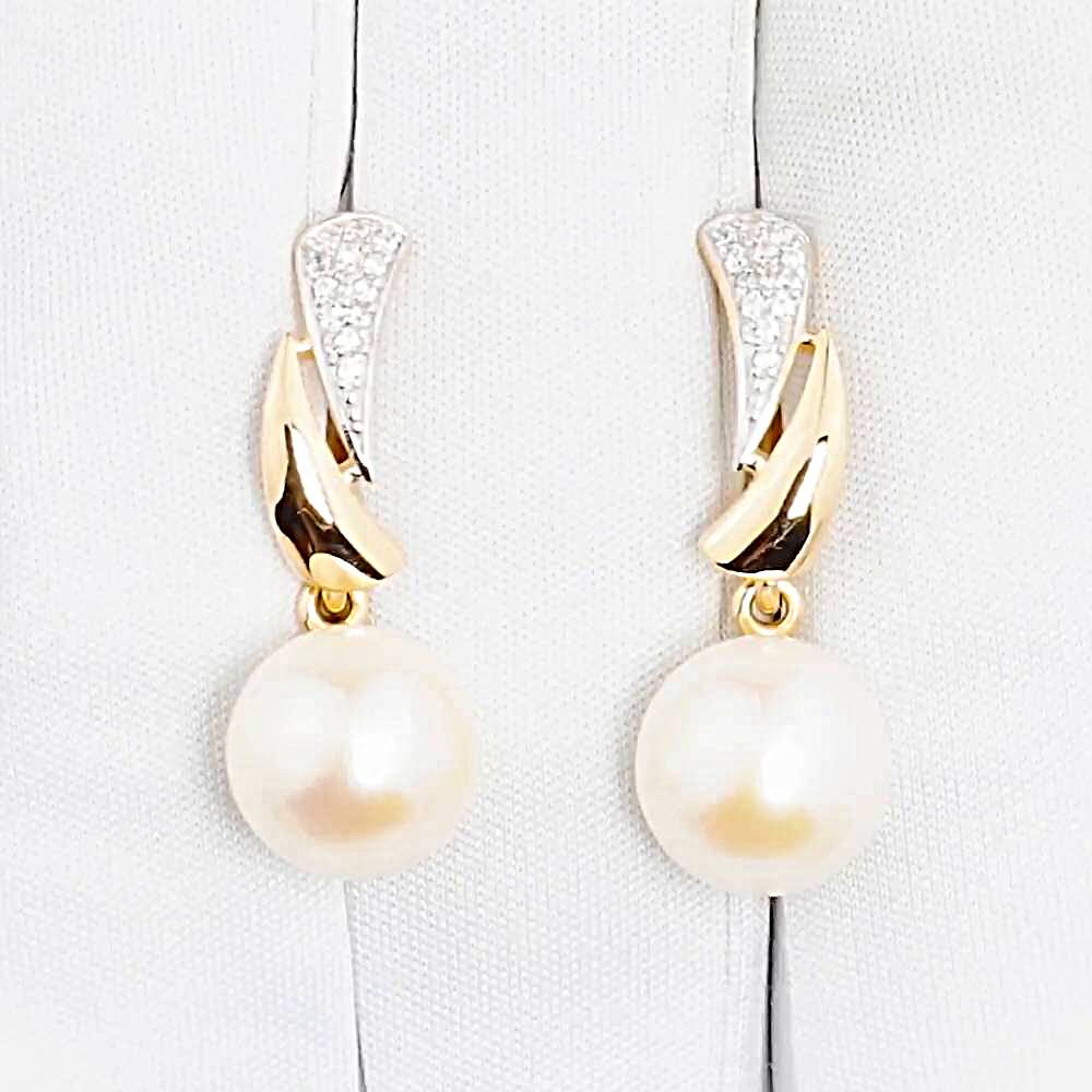 Серьги с культивированным жемчугом и фианитами из красного золота 585 пробы