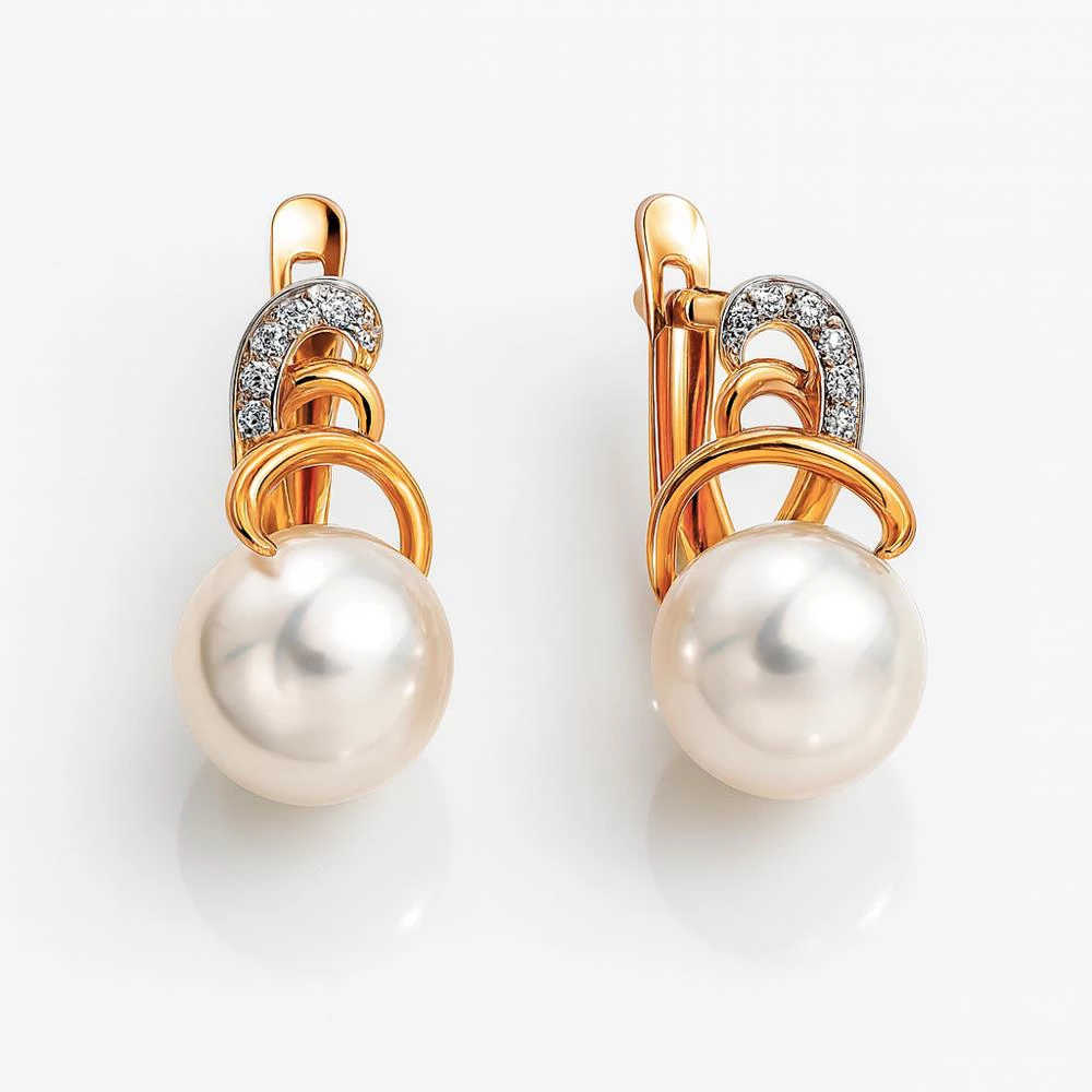 Серьги с культивированным жемчугом и фианитами из красного золота 585 пробы Серьги с культивированным жемчугом и фианитами из красного золота 585 пробы