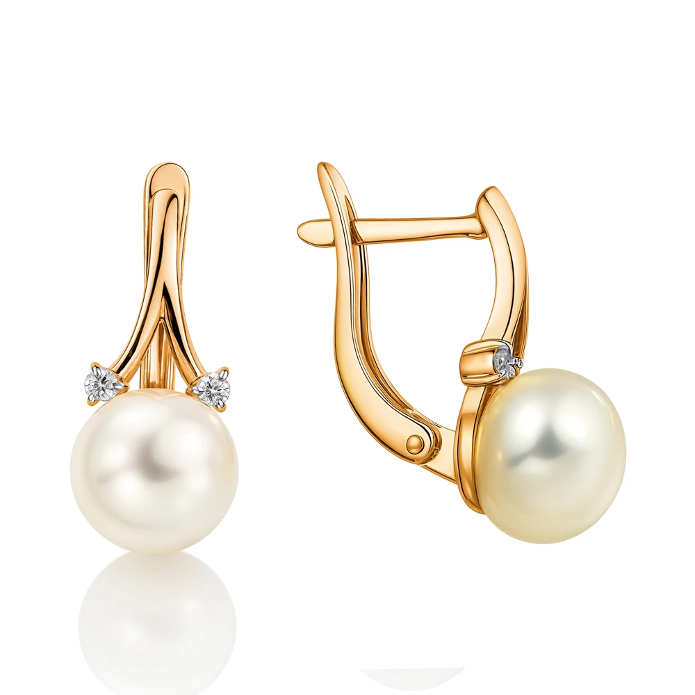 Серьги с культивированным жемчугом и фианитами из красного золота 375 пробы Серьги с культивированным жемчугом и фианитами из красного золота 375 пробы