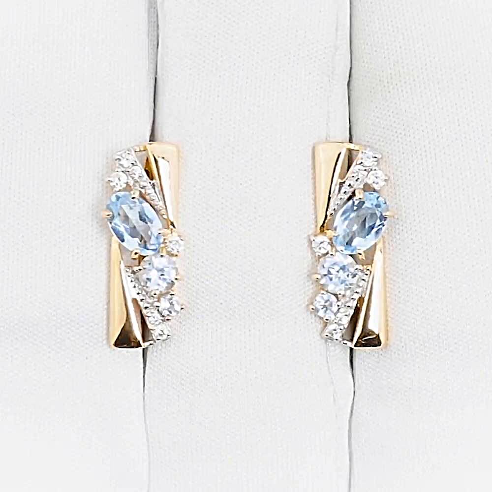 Серьги с топазами и фианитами из красного золота 585 пробы