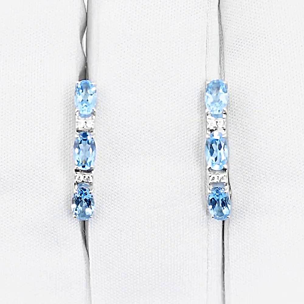 Серьги с топазами и фианитами из белого золота 585 пробы